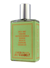 The large-sized bottle of Imaginary Authors Saint Julep perfume features a light green label with an orange border, suggesting the fresh and vibrant scent inside. The fragrance includes notes of tangerine, sweet mint, southern magnolia, bourbon, grisalva, sugarcube, and crushed ice. It is topped with a metallic silver cap.