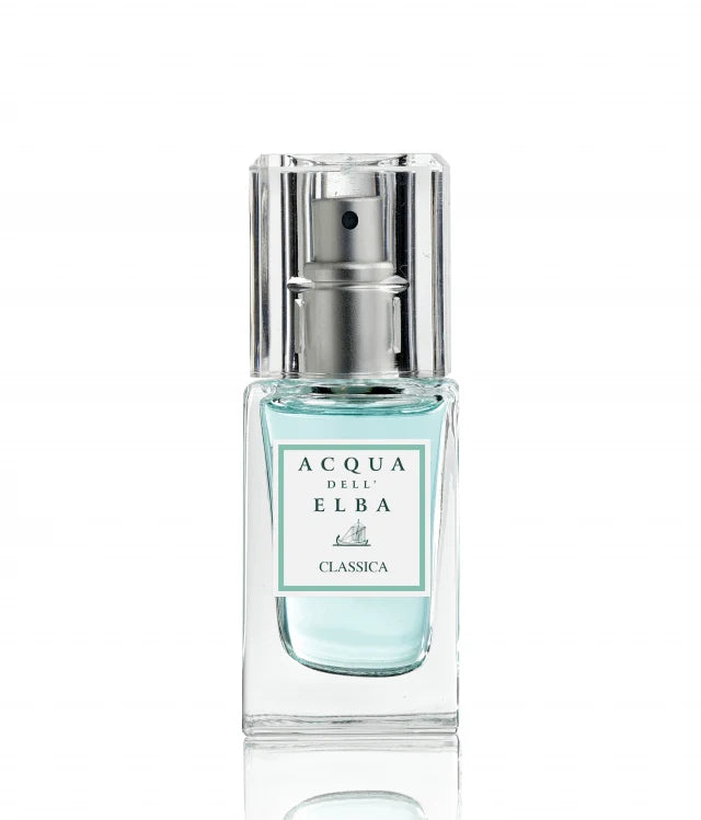 This distinct fragrance for men is available in a travel-size, clear square bottle with a silver spray nozzle. The label displays "Acqua dell'Elba Classica Uomo EdP 15ml Travel Size" alongside a small boat illustration, and the bottle holds a light blue liquid ideal for any adventure.