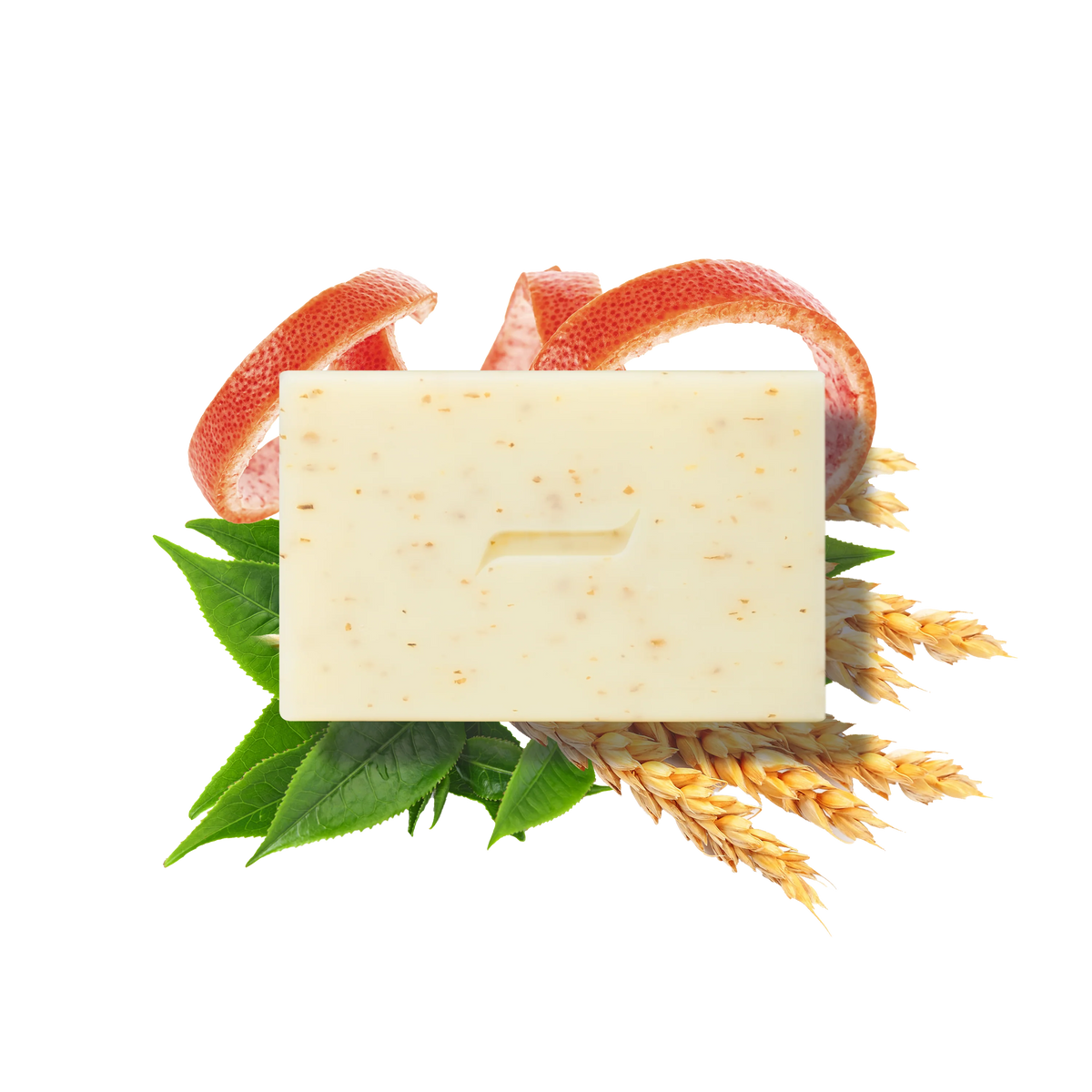 The Caswell-Massey Body Scrub Bar by Caswell Massey, featuring a minimal groove design, rests on green leaves, wheat stalks, and grapefruit peels. Made with natural ingredients, this beige speckled exfoliating soap is shown on a white background.