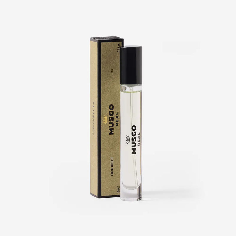 The Claus Porto Musgo Real 1887 Eau de Toilette Travel Size by Claus Porto 1887 features a clear glass vial beside its olive-green and black box, offering a sophisticated, portable fragrance for on-the-go elegance.