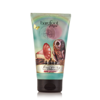 A tube of Barefoot Venus Pink Pepper Lotion, a hydrating formula with shea butter and macadamia nut oil, features whimsical pastel artwork with an owl, vintage gramophone, compass, and butterfly on the label.
