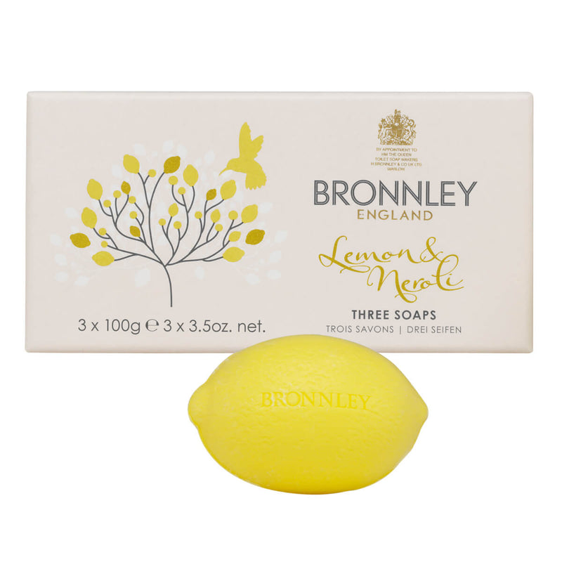 Box of Bronnley English Soaps luxurious Lemon & Neroli Soap - Boxed 3 x 100gm Hand Soaps with a single lemon-shaped soap bar in front of the packaging, illustrating the product's type and scent.
