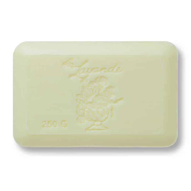 A rectangular, pale yellow La Lavande Pear Apple French Bath Soap bar (250g), embossed with "Lavende" and a decorative motif, enriched with Shea Butter for a luxurious cleanse.
