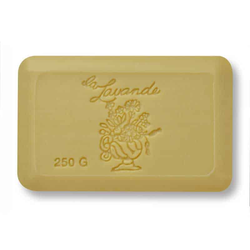 La Lavande Verbena French Bath Soap is a rectangular beige triple-milled bar embossed with "la Lavande," a floral design, and "250 G." Enriched with shea butter, it offers a luxurious cleanse.