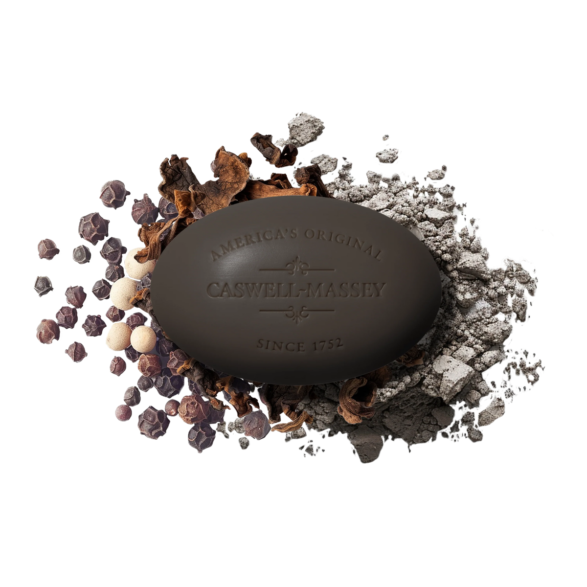 A dark Caswell-Massey Oaire Bar Soap, embossed with "America's Original Caswell-Massey Since 1752," rests on scattered peppercorns and spices, adding natural elegance to your daily ritual.