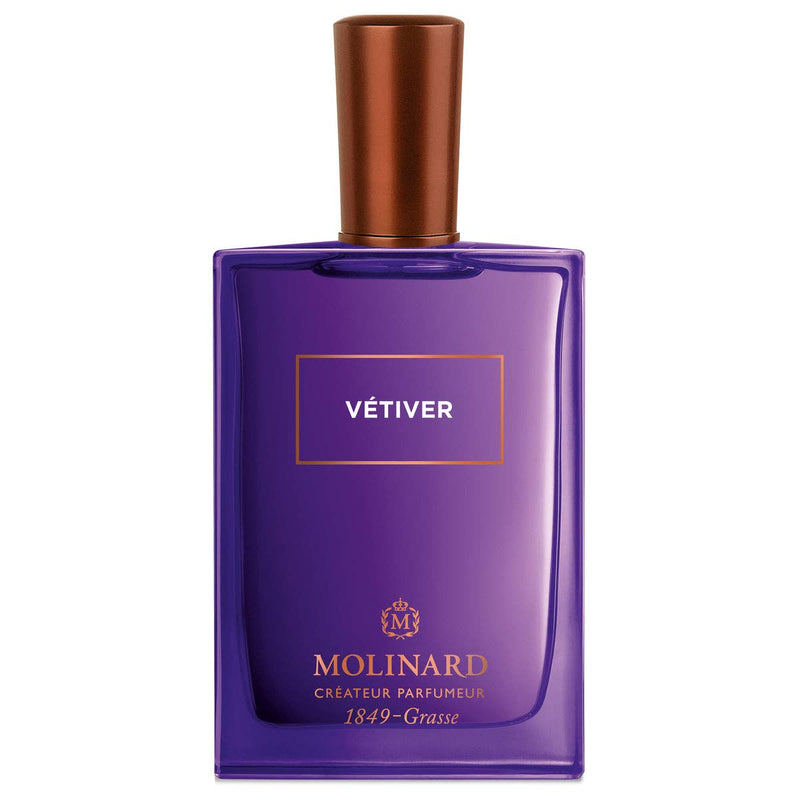 A purple rectangular bottle of Molinard Vétiver Eau de Parfum features a copper cap and “Vétiver” in white inside a gold-bordered box, reflecting its woody scent, with the Molinard gold signature at the base.
