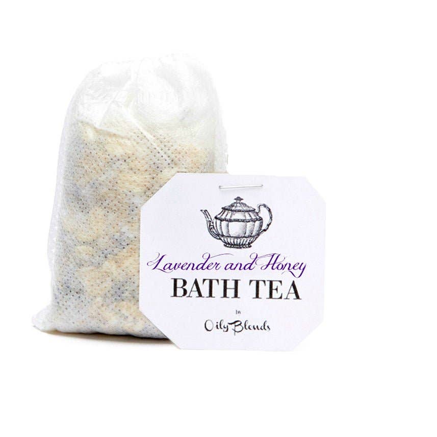 Labeled "Bath Tea Single Bag - Lavender and Honey" by Hampton Court, this mesh bag offers soothing effects. Filled with calming dried ingredients, the packaging features a charming teapot icon that promises relaxation and tranquility in every bath.