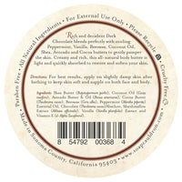 A round label for "Three Sisters Apothecary Dark Chocolate & Mint Body Butter." The label highlights its natural ingredients like shea butter, cocoa butter, and cocoa absolute. Directions advise applying on slightly damp skin. Notably paraben-free, cruelty-free, made in Sonoma County, CA, with a hint of natural botanicals.