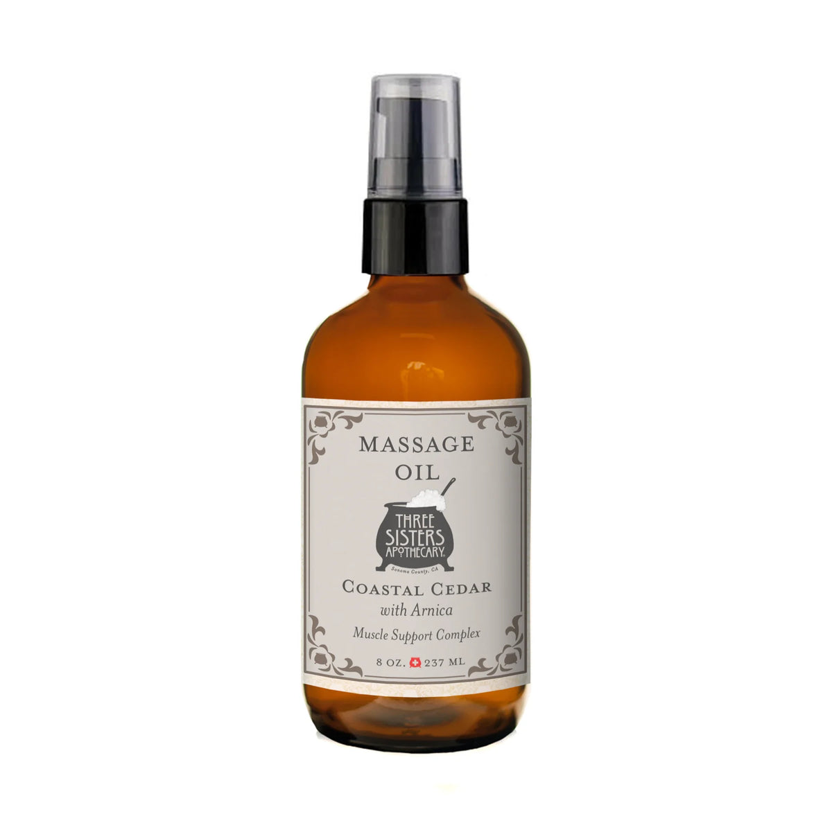 Three Sisters Apothecary Coastal Cedar with Arnica Therapeutic Massage Oil comes in an 8 oz amber glass bottle with a black pump and white label. This botanical blend offers muscle relief.