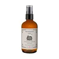 Three Sisters Apothecary Coastal Cedar with Arnica Therapeutic Massage Oil comes in an 8 oz amber glass bottle with a black pump and white label. This botanical blend offers muscle relief.