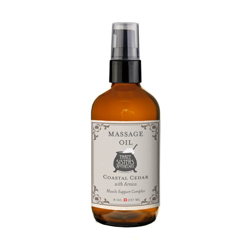 Three Sisters Apothecary Coastal Cedar with Arnica Therapeutic Massage Oil comes in an 8 oz amber glass bottle with a black pump and white label. This botanical blend offers muscle relief.