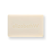 A single bar of the elizabeth W Purely Essential Grapefruit Soap, with the text "elizabethw" embossed on its surface, displayed against a plain white background.