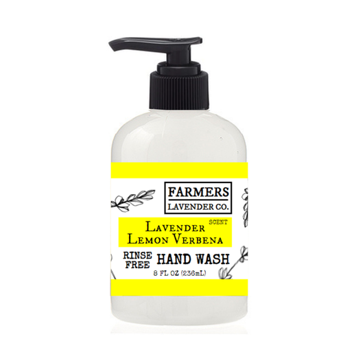 FARMERS Lavender Co. Rinse Free Hand Wash Lavender Lemon Verbena comes in a clear 8 fl oz bottle with a yellow accent and simple black and white design, offering an aromatherapeutic hand wash experience.