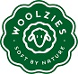 A green circular logo with a white sheep's face and white text: "Woolzies" above and "Soft by Nature" below, reflecting Woolzies Eucalyptus Essential Oil’s natural cleaning properties.