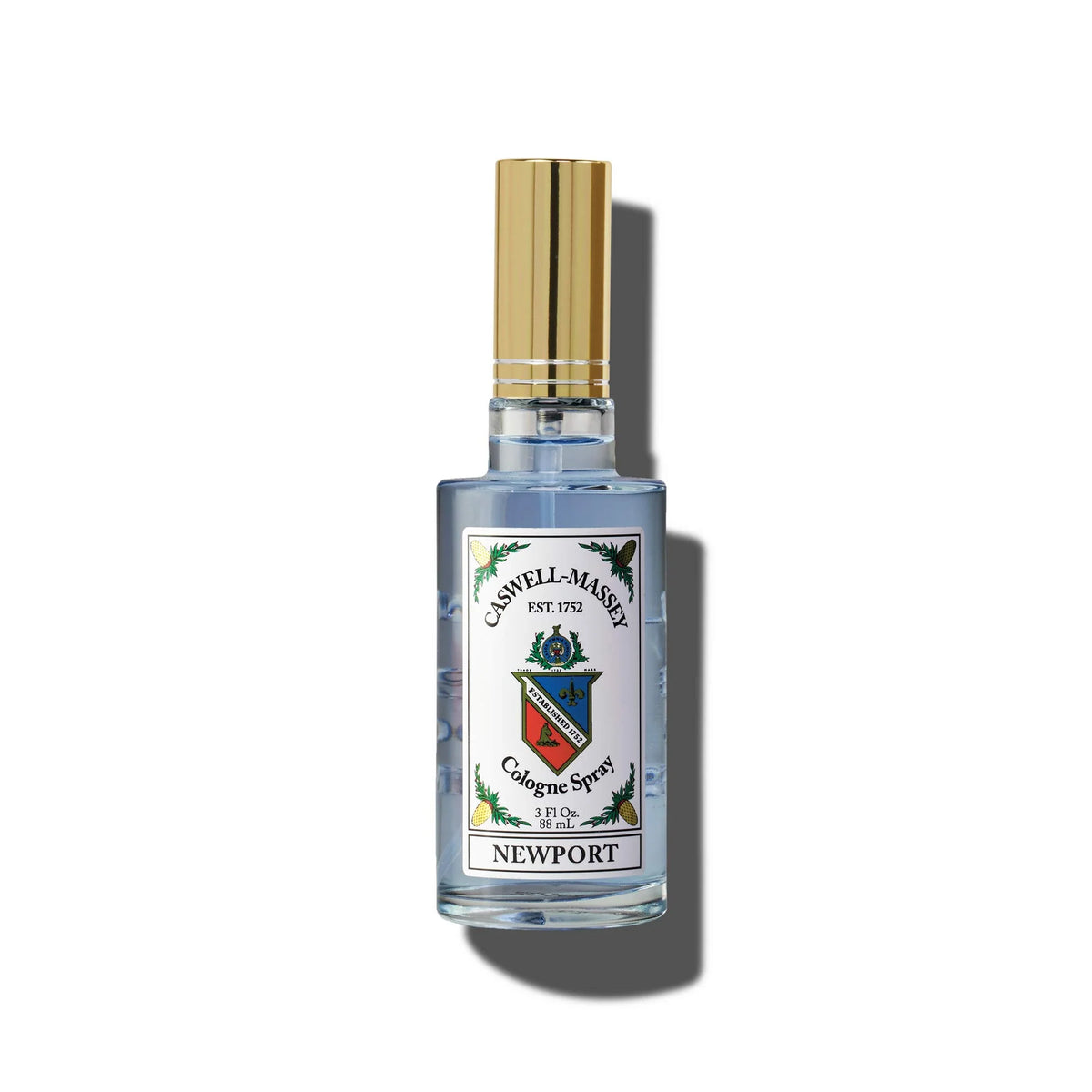 A picture of a Caswell Massey Newport Cologne spray bottle labeled "Newport Cologne" with a sophisticated nautical crest design on a white background.