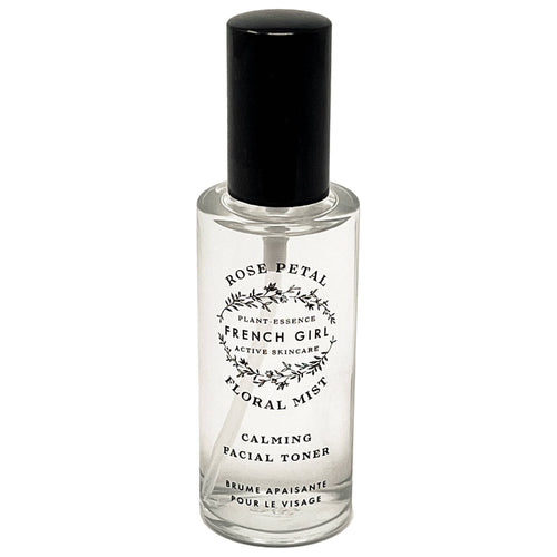 The FRENCH GIRL Organic Floral Face Mist Hydrating Toner - French Rose is a clear glass spray bottle with a black cap and floral design, perfect for organic skincare lovers seeking a refreshing, rose-infused hydrating mist.
