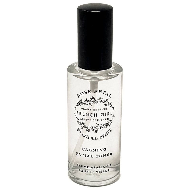 The FRENCH GIRL Organic Floral Face Mist Hydrating Toner - French Rose is a clear glass spray bottle with a black cap and floral design, perfect for organic skincare lovers seeking a refreshing, rose-infused hydrating mist.