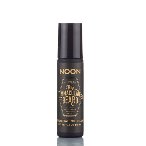 A 10ml black cylindrical bottle of The Immaculate Beard NOON Cologne Oil features a black label with gold accents—ideal for grooming enthusiasts seeking a refined fragrance from The Immaculate Beard.