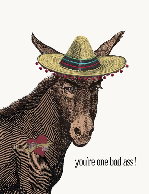 The "You’re One Bad Ass!" card by P. Flynn Design / Phun House features a donkey in a colorful sombrero with a heart tattoo, printed on premium paper—a playful way to celebrate someone special.