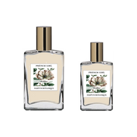 Two clear oil-based FRENCH GIRL Sambac Organic Vegan Jasmine Natural Aromatherapy Perfume bottles with gold caps, floral designs, and "Jasmin" labels appear in different sizes against a crisp white background.