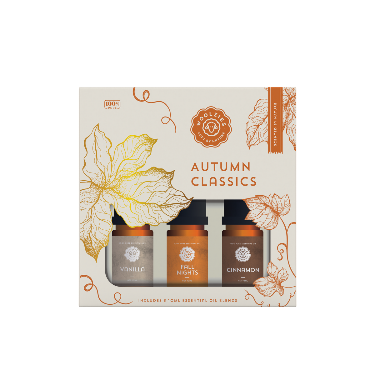 The Woolzies Autumn Classics Collection boxed set features three 10ml autumn-inspired essential oils—Vanilla, Fall Nights, and Cinnamon—in a package with orange botanicals and warm hues, capturing the cozy essence of fall.