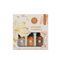 The Woolzies Autumn Classics Collection boxed set features three 10ml autumn-inspired essential oils—Vanilla, Fall Nights, and Cinnamon—in a package with orange botanicals and warm hues, capturing the cozy essence of fall.