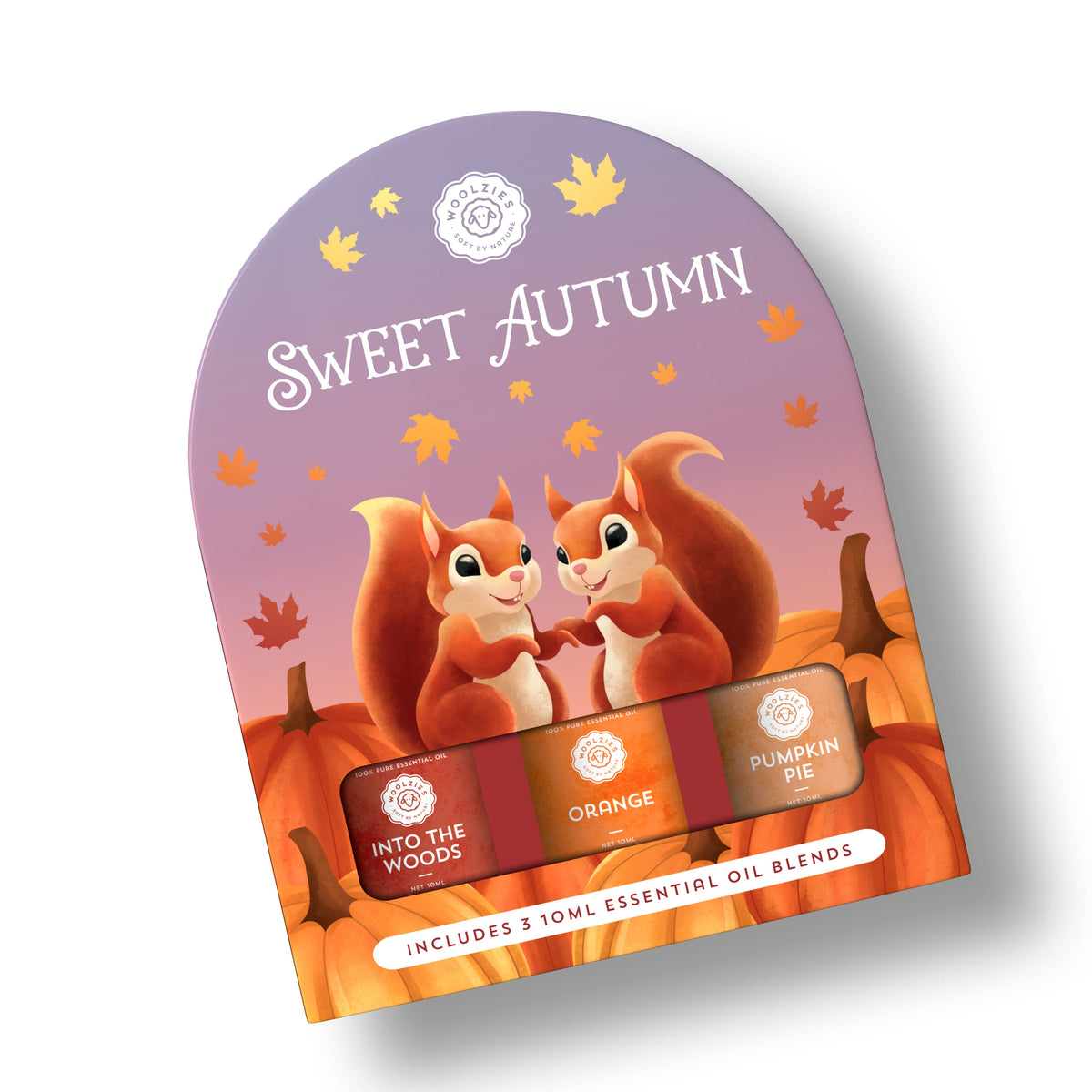 The Woolzies Sweet Autumn Collection packaging shows two smiling squirrels among pumpkins and autumn leaves. "Sweet Autumn" text appears, featuring three essential oils: Into the Woods, Orange, and Pumpkin Pie by Woolzies.