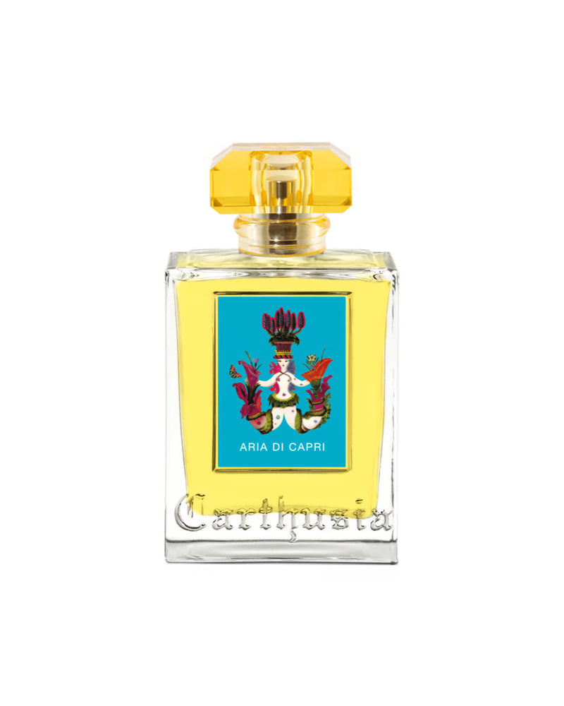 A luxurious Carthusia Aria di Capri Eau de Parfum - 100ml bottle with a Mediterranean fragrance, featuring a yellow label adorned with a vintage-style illustration of a cherub and flowers, topped with a crystal-cut yellow cap from Carthusia I Profumi de Capri.