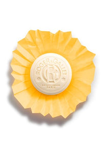 Roger & Gallet Orange Wood Wellbeing Soaps Set (3 x 3.5 oz) features round bars embossed with the brand logo, each wrapped in pleated yellow paper—a classic artisanal soap from Roger & Gallet.