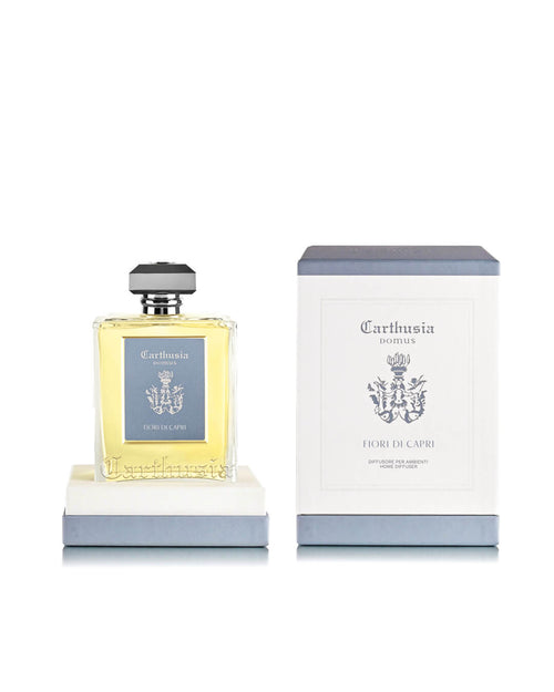 The Carthusia I Profumi di Capri Fiori di Capri Reed Diffuser (230ml) sits beside its elegant box, bringing a refined touch of fragrance to any room.