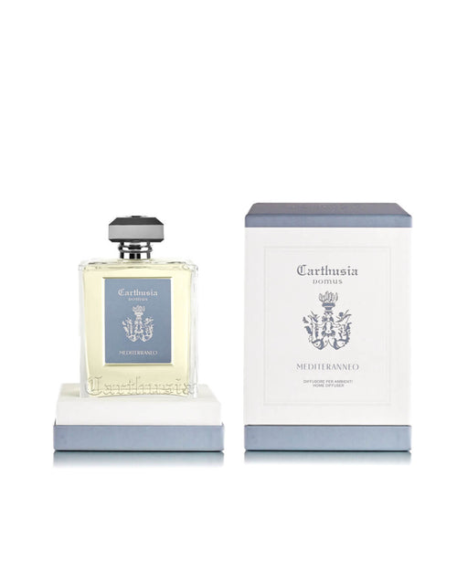 The Carthusia Mediterraneo Reed Diffuser (230ml) by Carthusia I Profumi di Capri sits beside its matching box, both featuring blue and white labels, bringing Italian minimalism and luxurious home fragrance to your space.