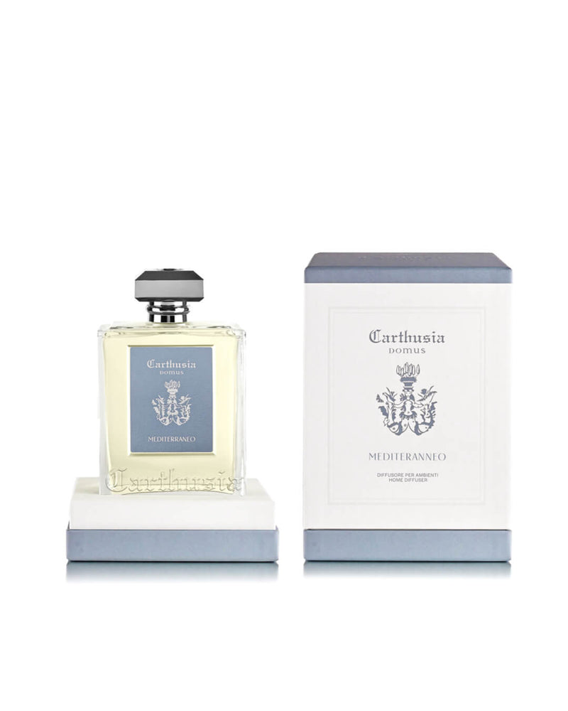The Carthusia Mediterraneo Reed Diffuser (230ml) by Carthusia I Profumi di Capri sits beside its matching box, both featuring blue and white labels, bringing Italian minimalism and luxurious home fragrance to your space.