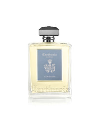 The Carthusia Corallium Reed Diffuser (230ml) by Carthusia I Profumi di Capri features pale yellow liquid in a clear glass bottle with a silver and black cap—a woody aromatic home fragrance for any space.