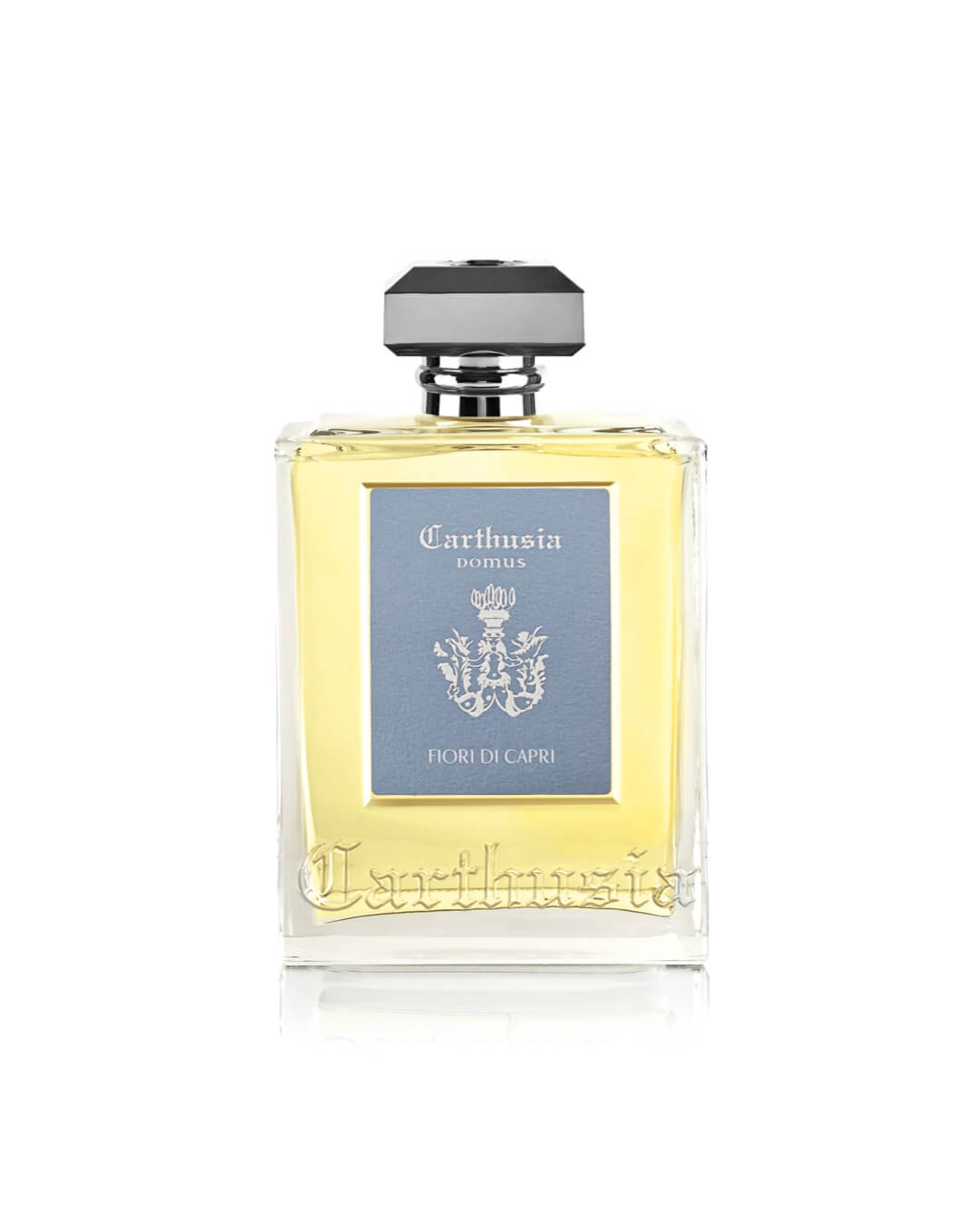 The Carthusia I Profumi di Capri Fiori di Capri Reed Diffuser (230ml) features a rectangular glass bottle with black cap and crest label, filled with light yellow fragrance—ideal for an elegant home scent or pairing with a reed diffuser.