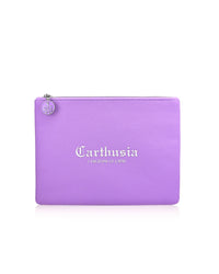 A flat, rectangular purple pouch with a silver zipper and a small circular charm. The text "Carthusia I Profumi di Capri" is printed in white on the front of this luxurious Carthusia Gelsomini (Jasmine of Capri) Travel Clutch Bag, perfect for holding Carthusia Gelsomini essentials or Jasmine of Capri fragrance items.