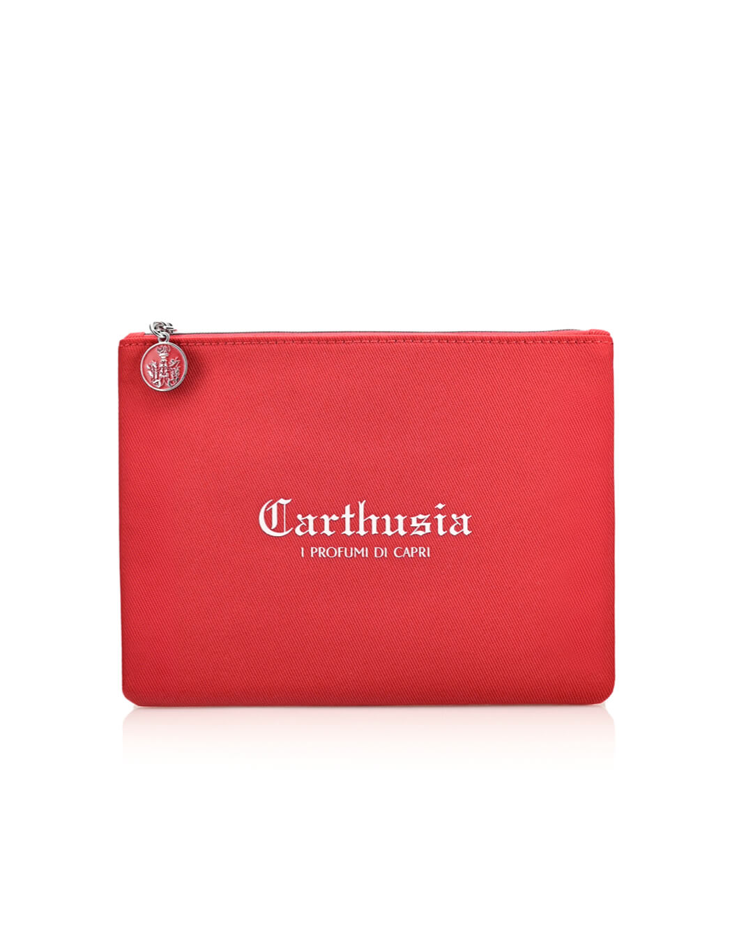 A red Carthusia Corallium Travel Clutch Bag with a silver circular zipper pull featuring a design. The pouch is branded with the text "Carthusia I Profumi di Capri" in white lettering centered on the front, reminiscent of Carthusia Corallium’s scented woods.