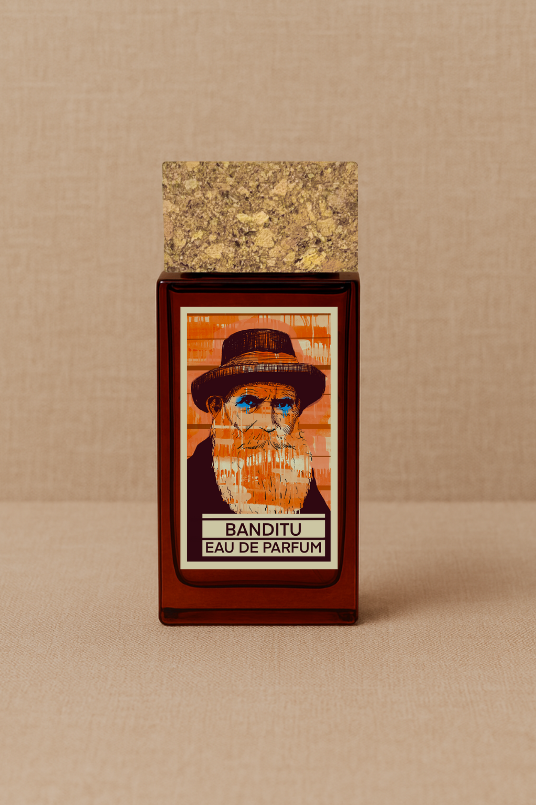 A rectangular perfume bottle with a cork-like cap, labeled "ISULA parfums Banditu eaux de parfum." The label features an abstract bearded man in a hat on an orange background—a distinctive Corsican fragrance from ISULA parfums.