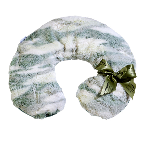 The Sonoma Lavender Sonoma Eucalyptus Snowmint Neck Pillow is a plush, U-shaped pillow in green and white with a soft, fluffy texture and a green "Sonoma" bow, designed for soothing neck relief.