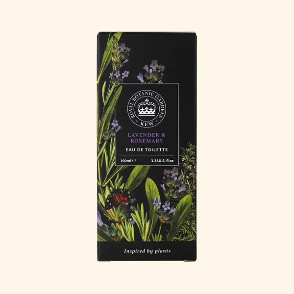 The English Soap Co. Kew Gardens Lavender and Rosemary Eau de Toilette comes in a rectangular box with botanical lavender and rosemary illustrations on a black background, featuring the Kew Gardens logo. This vegan-friendly scent offers a long-lasting fragrance.