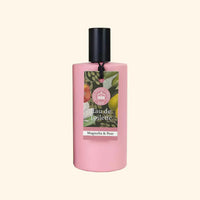 The English Soap Co. Kew Gardens Magnolia and Pear Eau de Toilette is a pink vegan fragrance with a black cap, featuring a magnolia and pear label. Inspired by Kew Gardens, it offers elegant, fresh floral notes.