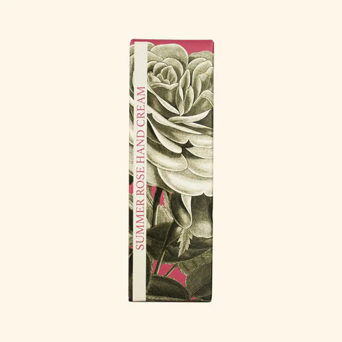 A rectangular box of The English Soap Co. Kew Gardens Summer Rose Hand Cream displays a large black and white vintage-style rose illustration on muted pink, capturing the luxury and cruelty-free essence of this hand cream.
