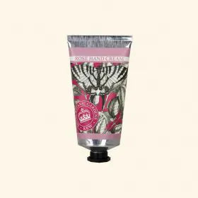 A metallic tube of The English Soap Co. Kew Gardens Summer Rose Hand Cream features botanical illustrations and a pink “Rose Hand Cream” label with a decorative seal, set on a light beige background—reflecting its classic elegance.