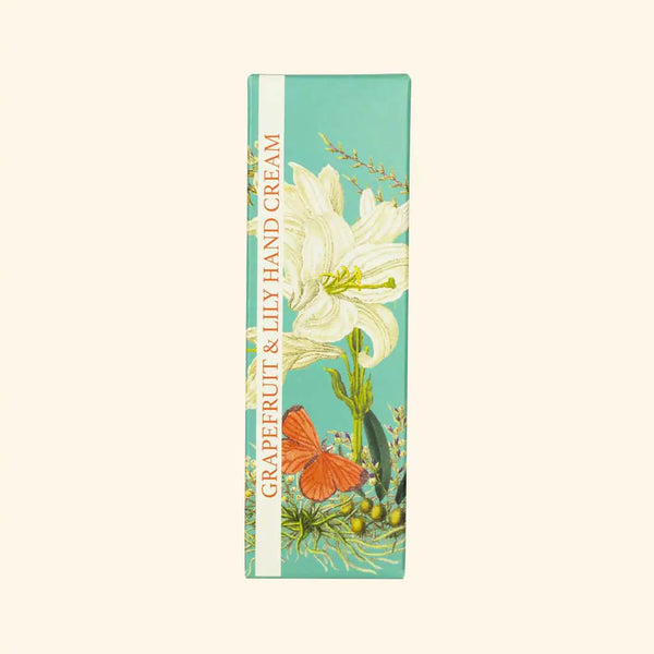 A rectangular box of The English Soap Co. Kew Gardens Grapefruit and Lily Hand Cream displays floral and butterfly illustrations on a turquoise background, with the product name in white along the left, offering sustainable luxury.