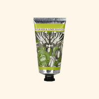 The English Soap Co. Kew Gardens Lemongrass and Lime Hand Cream features botanical artwork with green leaves, a butterfly, a cruelty-free seal, a black cap, and a fresh nature-inspired design.
