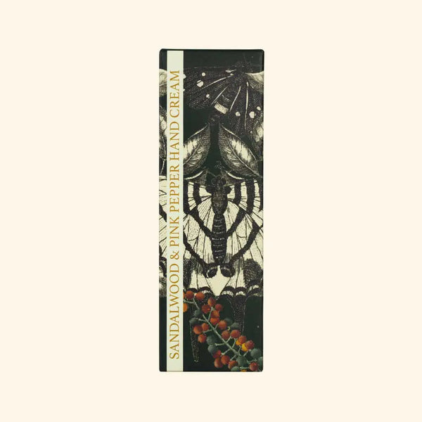 The English Soap Co. Kew Gardens Sandalwood and Pink Pepper Hand Cream comes in a rectangular box featuring black and white moths and red berries set against a light background.