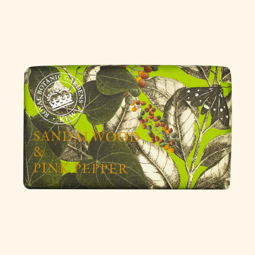 The English Soap Co. Kew Gardens Sandalwood & Pink Pepper Soap is a sustainable luxury bar wrapped in botanical paper with green leaves, red berries, and a butterfly.