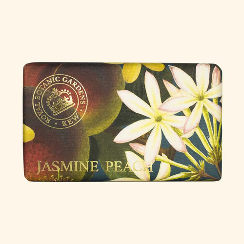 The English Soap Co. Kew Gardens Jasmine Peach Soap is a vegan, rectangular English soap bar in floral packaging with white jasmine, peaches, and gold "JASMINE PEACH" text, blending elegance and freshness inspired by Kew Gardens.