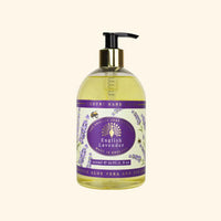 A 500ml bottle of The English Soap Co. English Lavender Hand Wash showcases yellow, moisturizing liquid soap within a transparent container. It features a purple label decorated with lavender illustrations and is equipped with a black pump dispenser bearing gold accents. The text emphasizes the inclusion of aloe vera, vitamin E, and eco-friendly packaging.