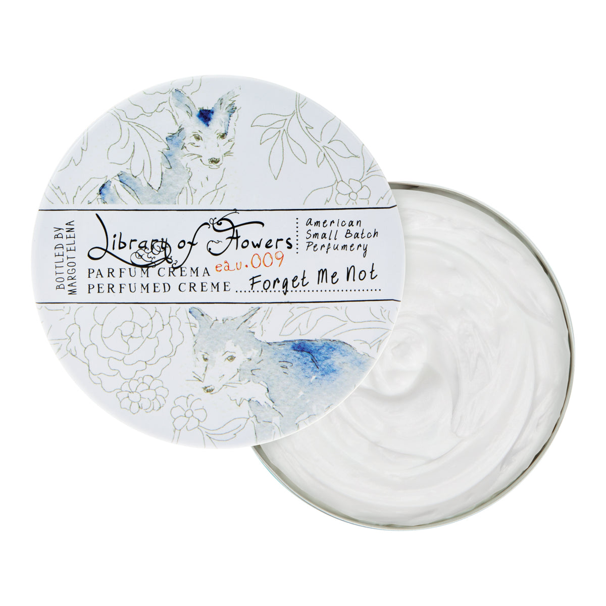 Circular tin of Margot Elena's Library of Flowers Forget Me Not Parfum Crema with a floral design on the lid and open to show the triple-scented white cream inside.