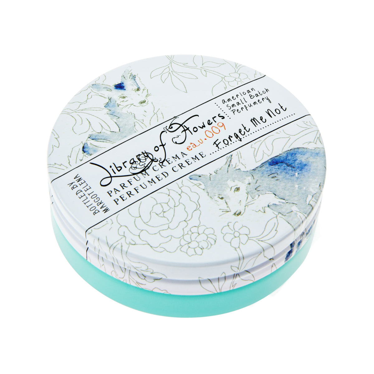Round container of Margot Elena's Library of Flowers Forget Me Not Parfum Crema with delicate floral illustrations in blue and white on the lid. Text on the top includes product details.